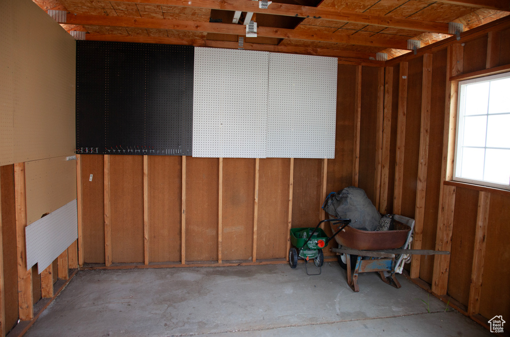 Interior space featuring unfinished concrete floors