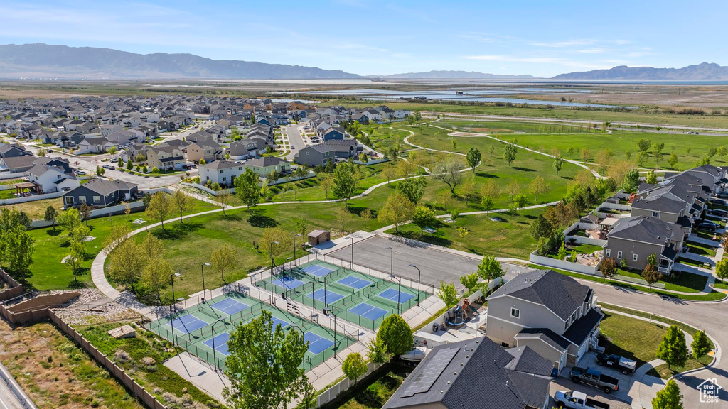 Aerial view featuring a water and mountain view and a residential view
