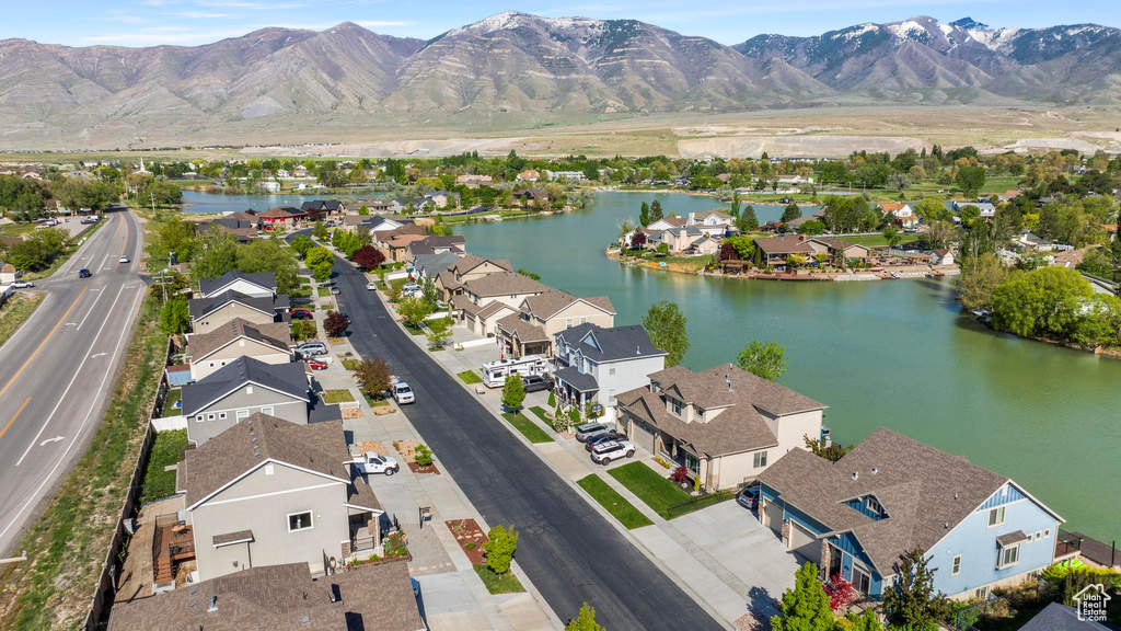 Bird\'s eye view with a residential view and a water and mountain view
