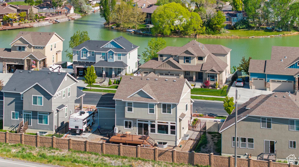 Bird\'s eye view with a water view and a residential view