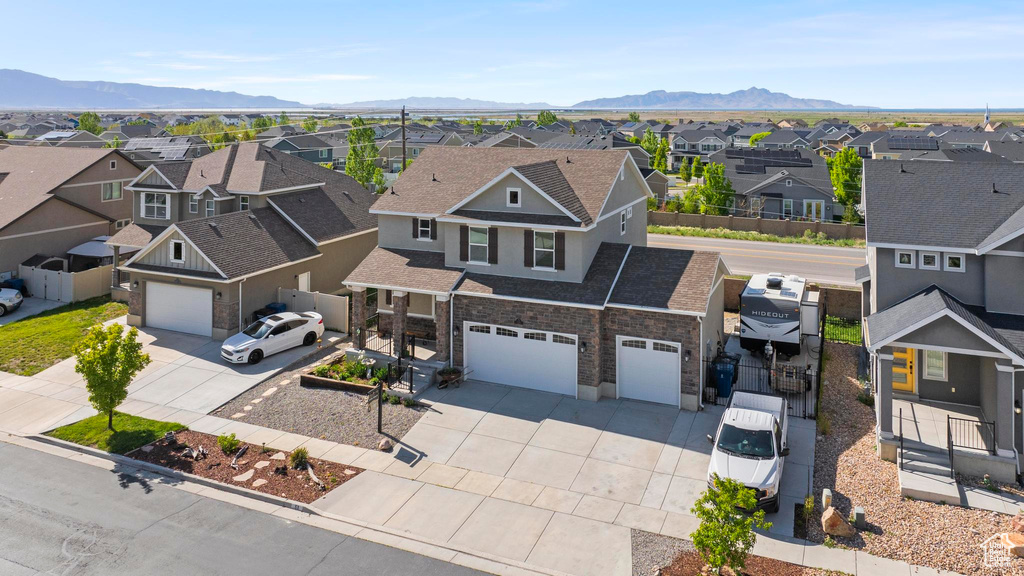 Aerial view featuring a mountain view and a residential view