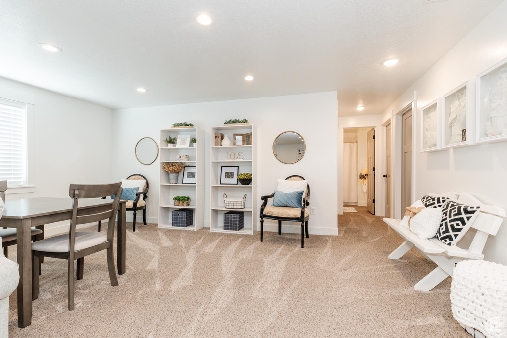 Interior space with recessed lighting, light carpet, and baseboards