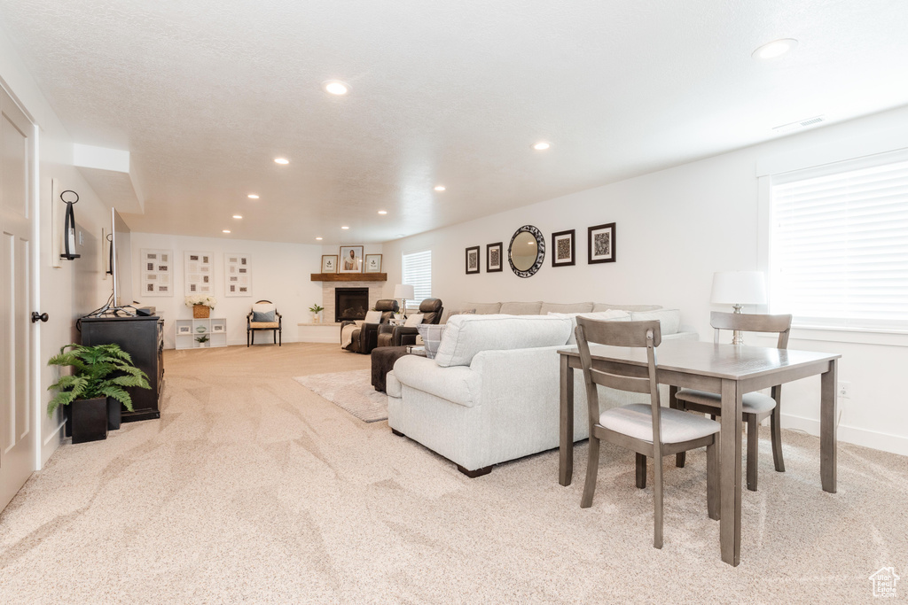 Living room featuring recessed lighting and carpet floors