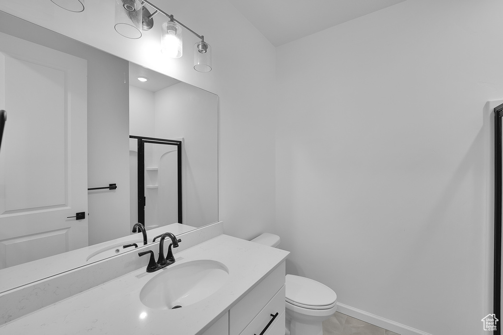 Bathroom featuring toilet and vanity