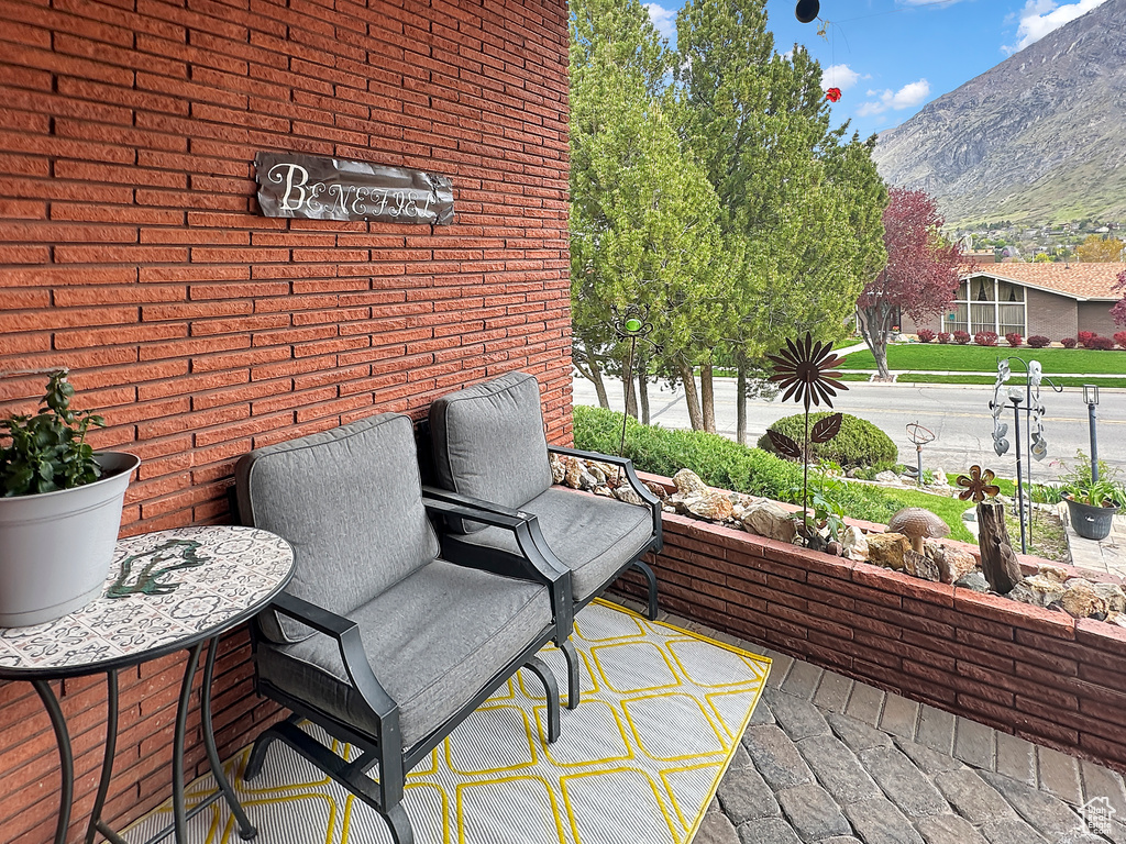 View of patio / terrace featuring a mountain view
