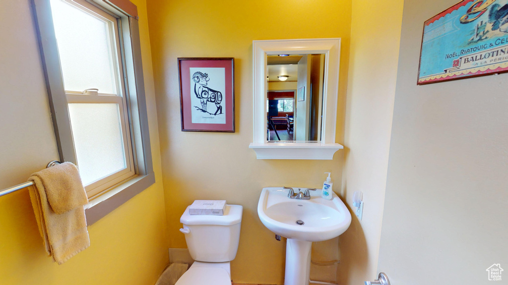 Bathroom with toilet and a sink
