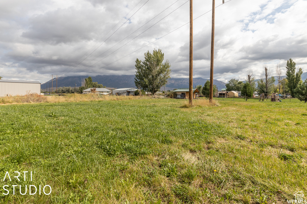 View of yard with a mountain view