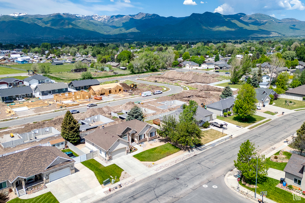 Aerial view of residential area featuring mountains