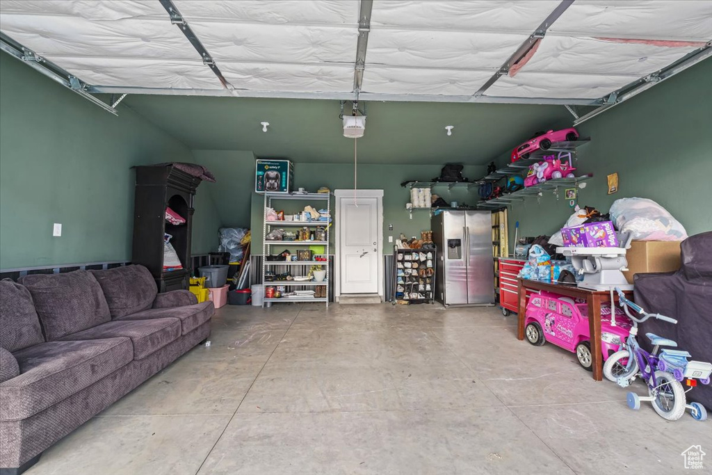 Garage with stainless steel fridge