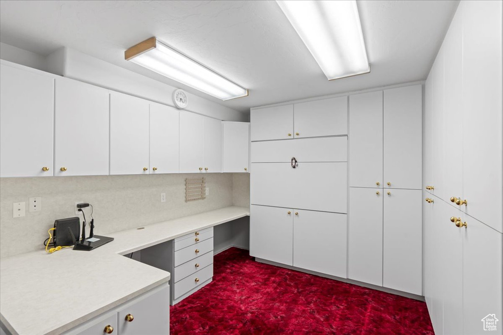 Interior space featuring built in desk