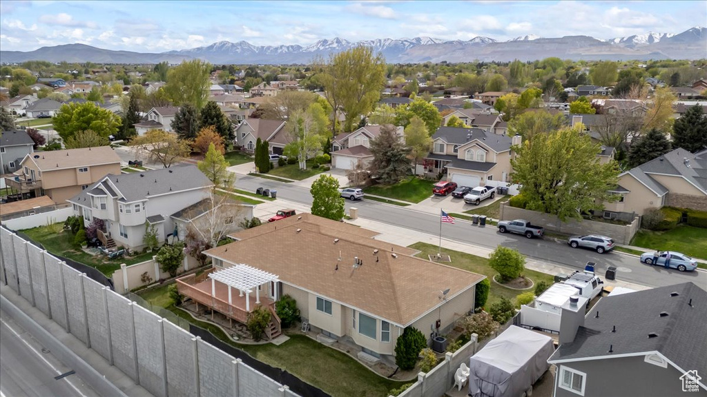 Drone / aerial view with a mountain view and a residential view