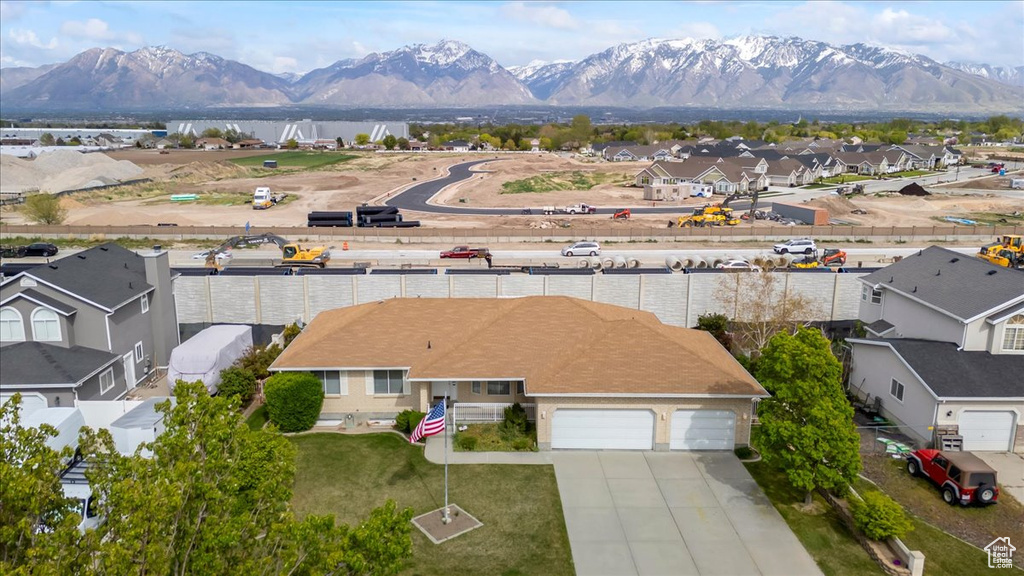Aerial view with a water and mountain view and a residential view