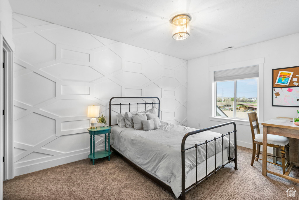 Bedroom with carpet