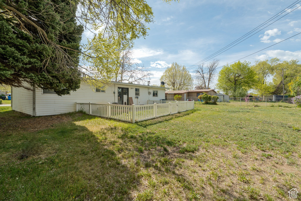View of yard with fence
