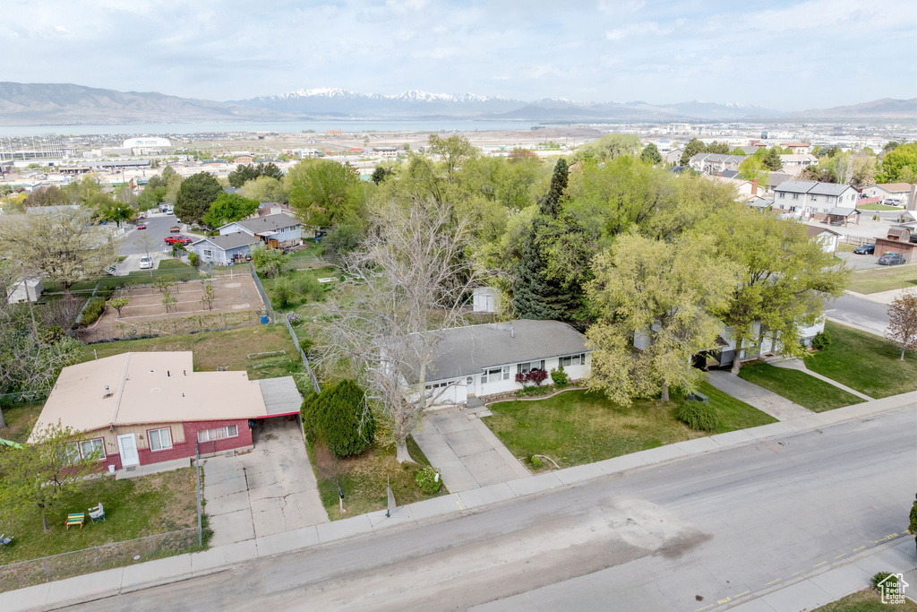 Drone / aerial view with a residential view and a mountain view