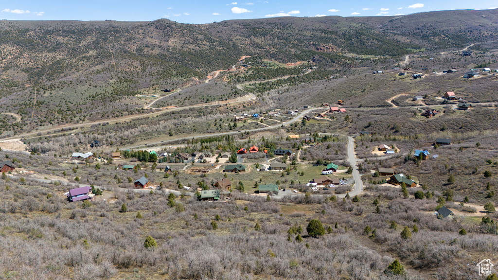 Aerial view featuring a rural view and a mountain view