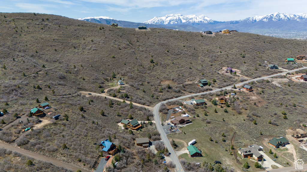 Aerial view featuring a mountain view, a rural view, and view of desert