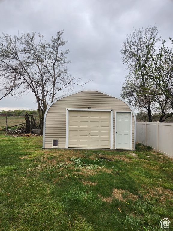 Detached garage with fence