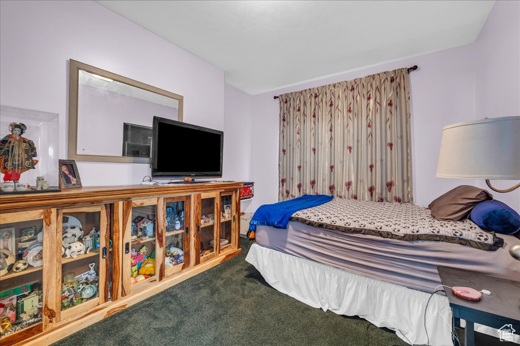 Bedroom featuring carpet flooring