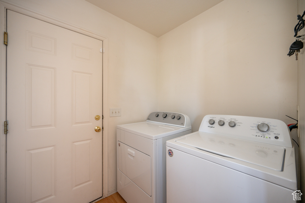 Laundry area featuring laundry area and washing machine and dryer