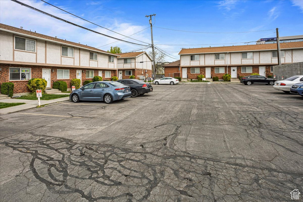 Uncovered parking lot with a residential view
