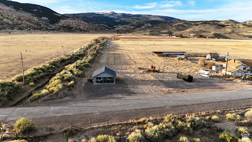Drone / aerial view featuring a mountain view and a rural view