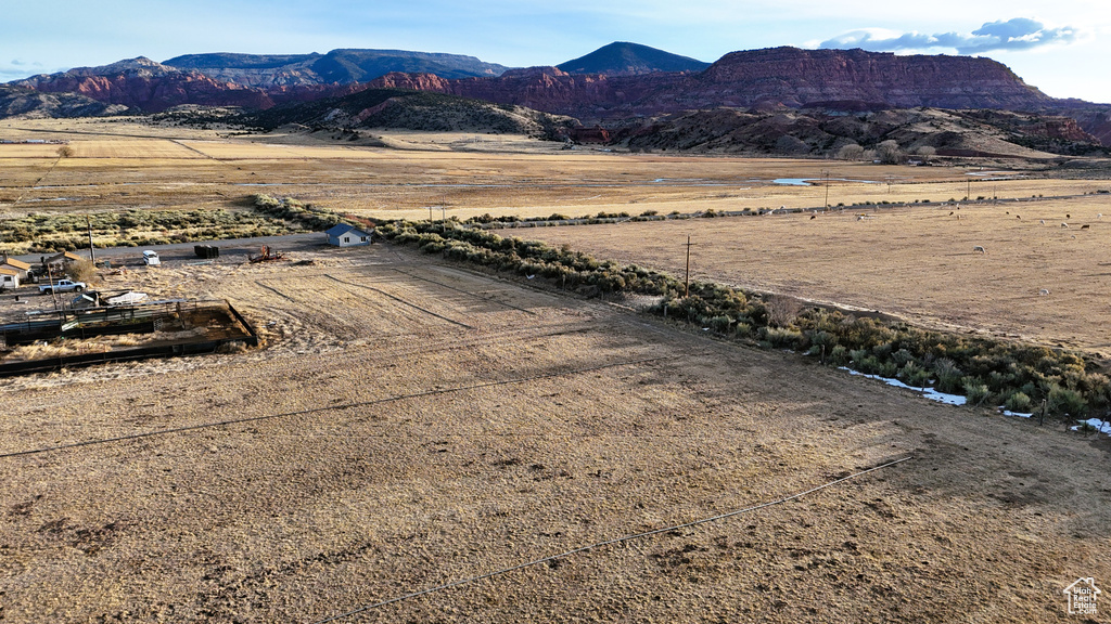 Birds eye view of property featuring a mountain view and a rural view