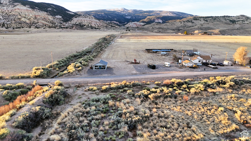 Aerial view featuring a rural view and a mountain view