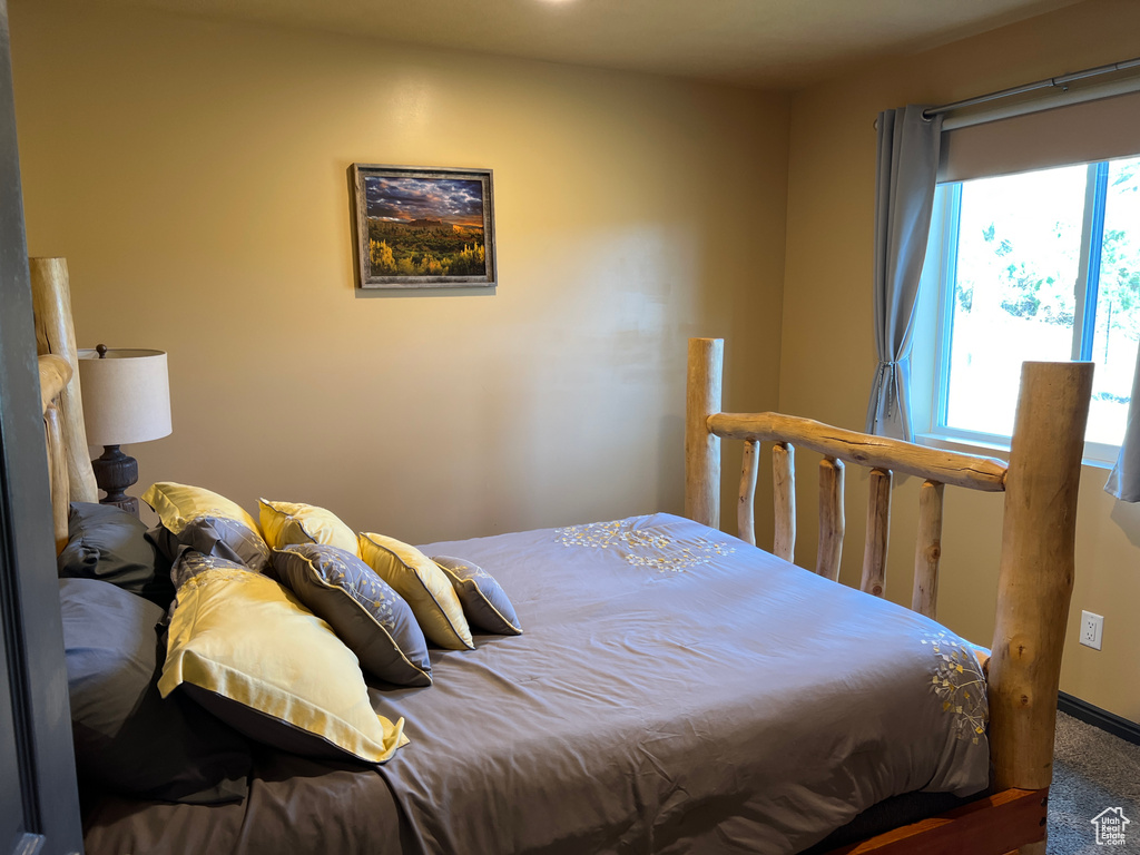 Bedroom featuring carpet