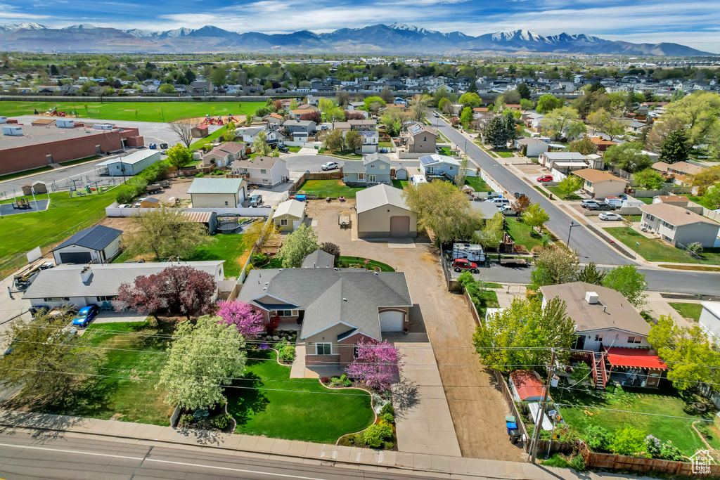 Drone / aerial view featuring a mountain view and a residential view