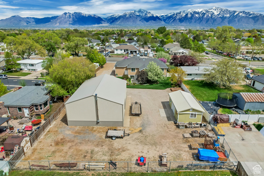 Drone / aerial view featuring a mountain view and a residential view