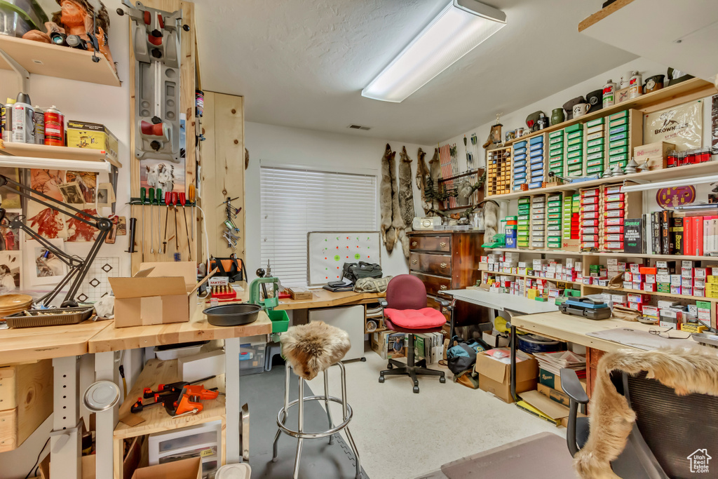 Interior space featuring a workshop area