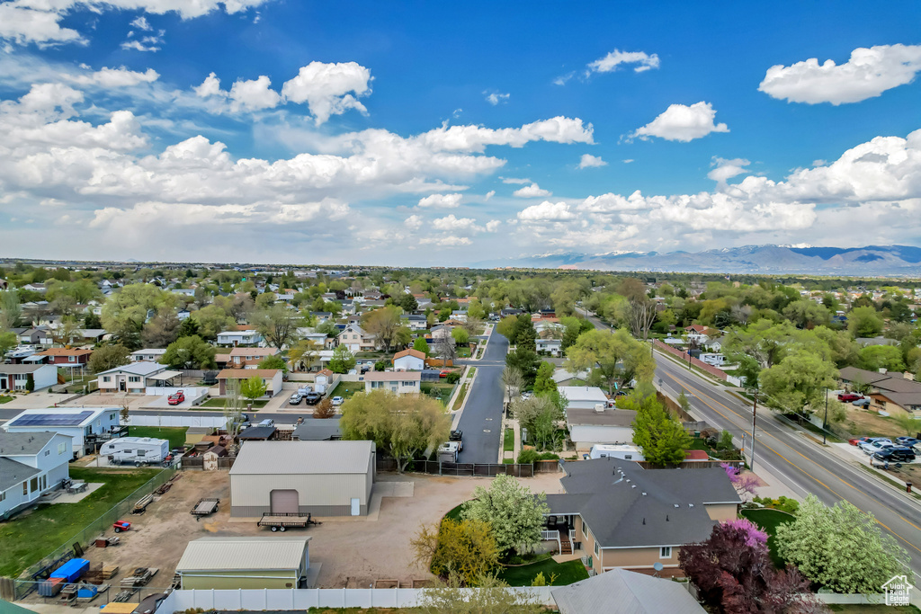 Drone / aerial view featuring a residential view and a mountain view