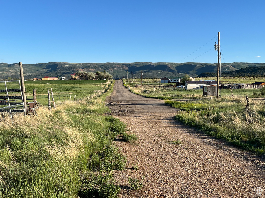 View of street featuring a mountain view and a rural view
