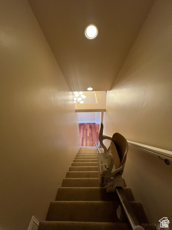 Staircase featuring recessed lighting