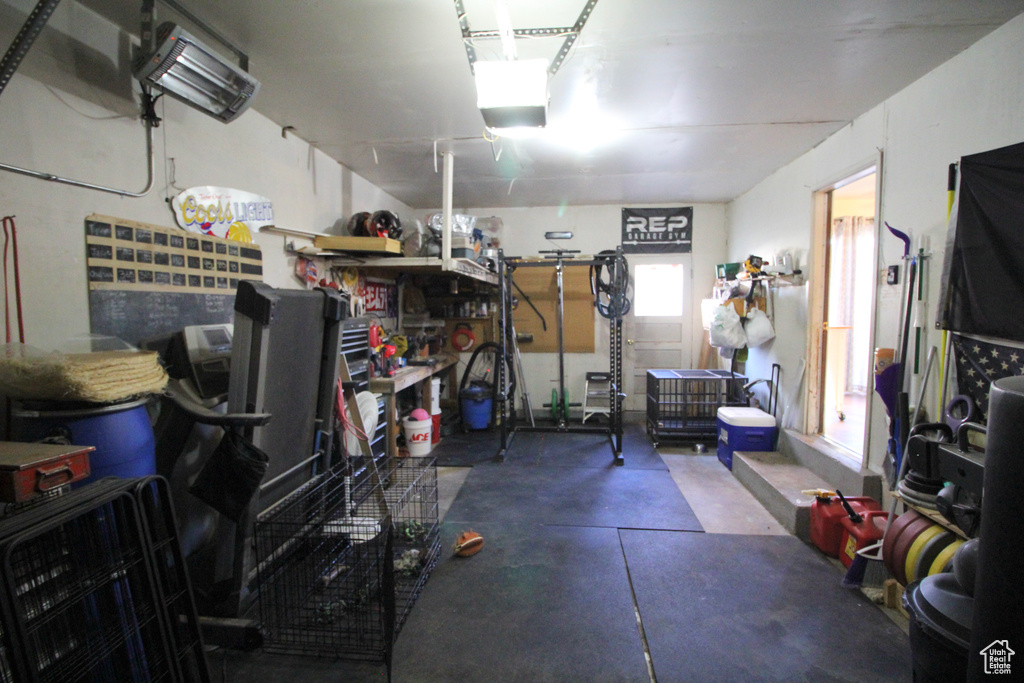 Interior space featuring a garage door opener