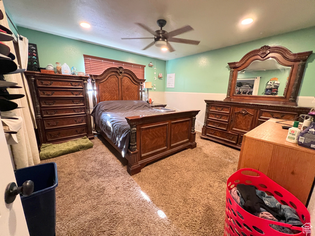 Bedroom featuring recessed lighting, a ceiling fan, light carpet, and baseboards