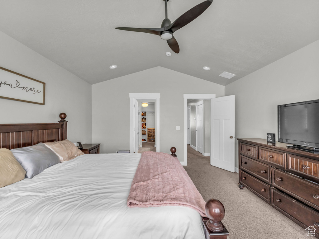 Carpeted bedroom featuring recessed lighting, a ceiling fan, lofted ceiling, and baseboards