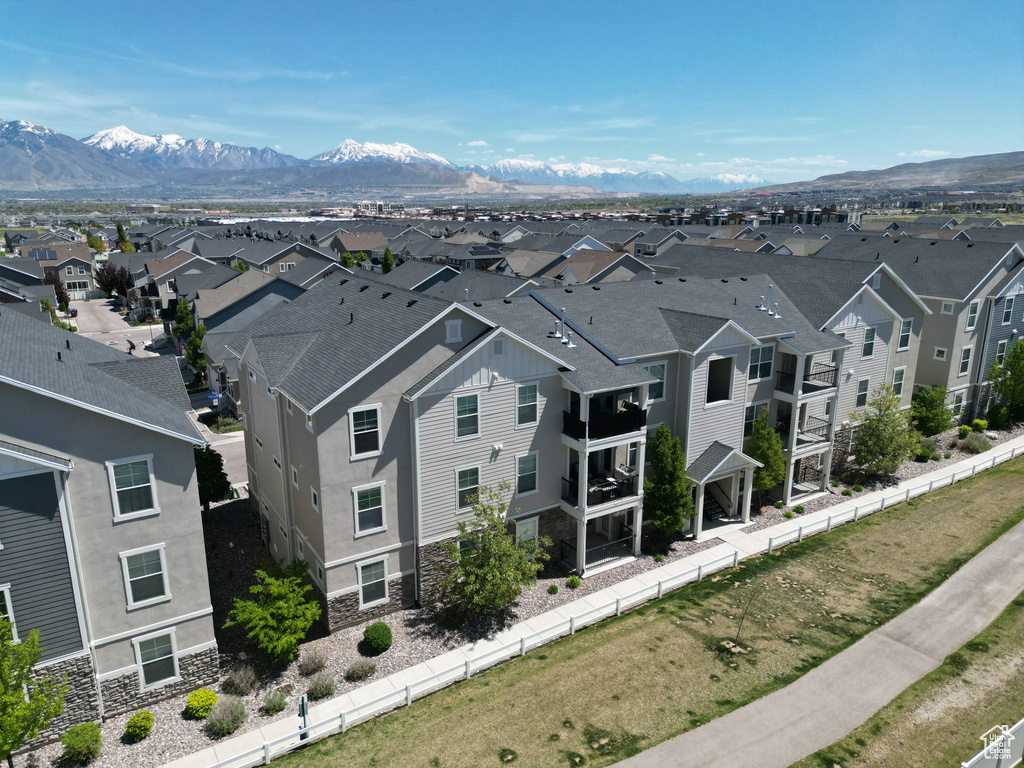 Drone / aerial view featuring a mountain view and a residential view