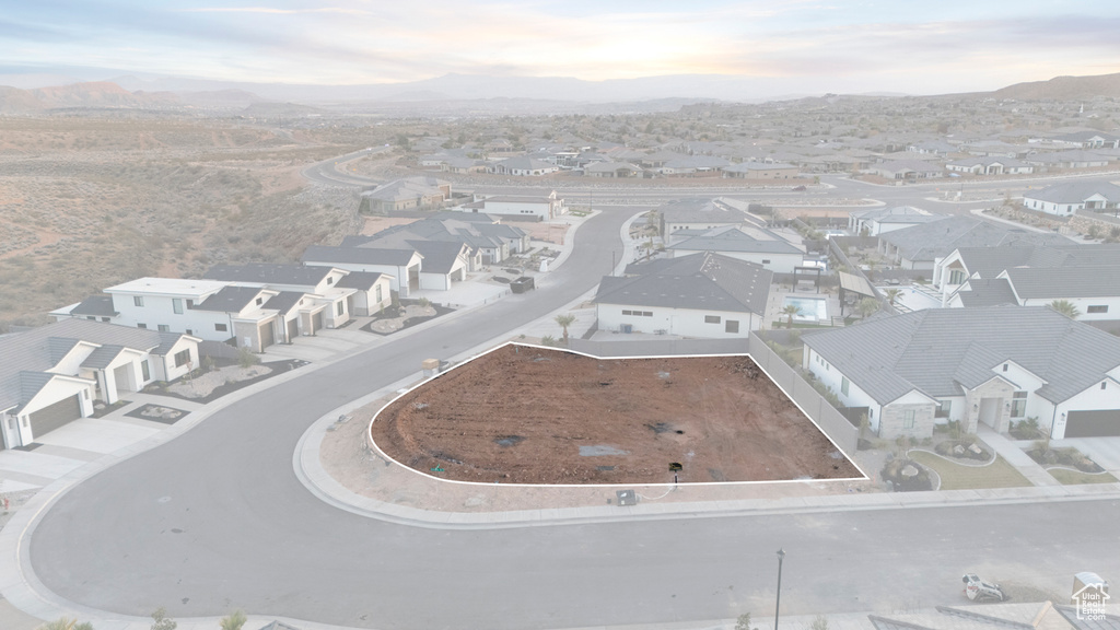 Drone / aerial view featuring a residential view and a mountain view