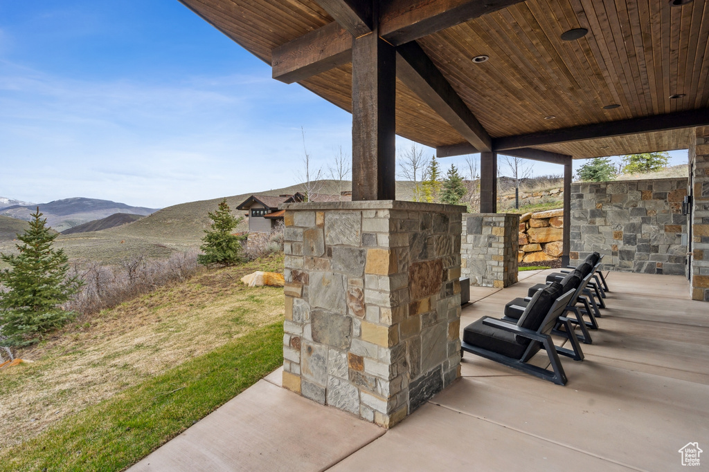 View of patio / terrace featuring a mountain view