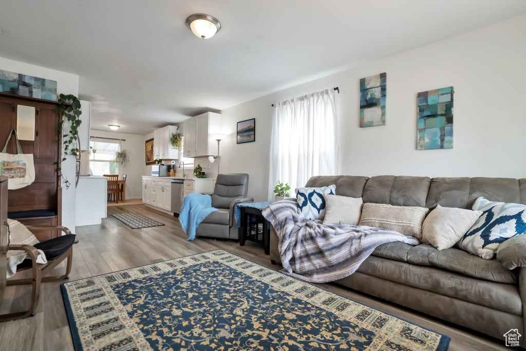 Living room with light wood-style floors