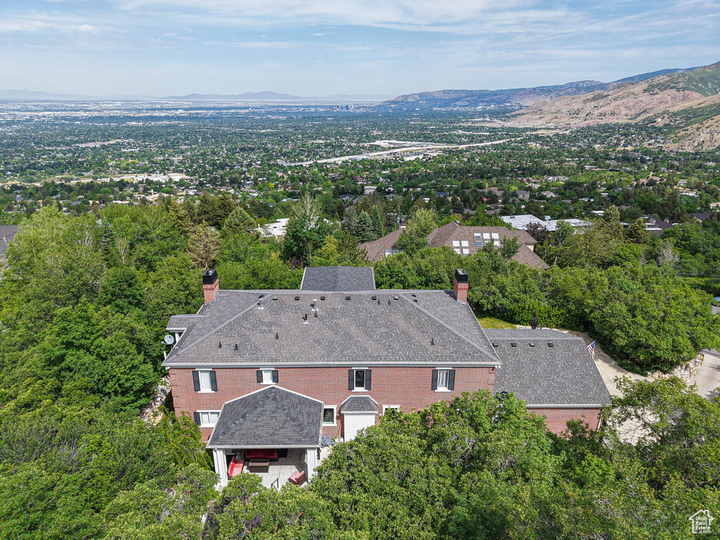 View of subject property featuring mountains