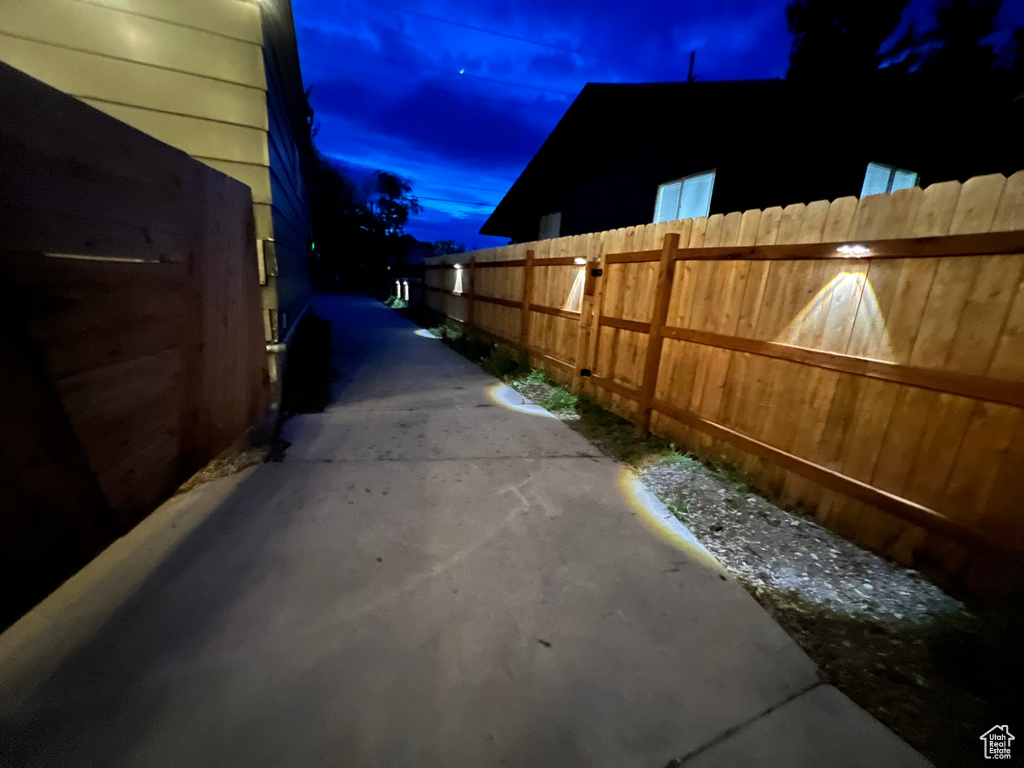 View of home's exterior with fence