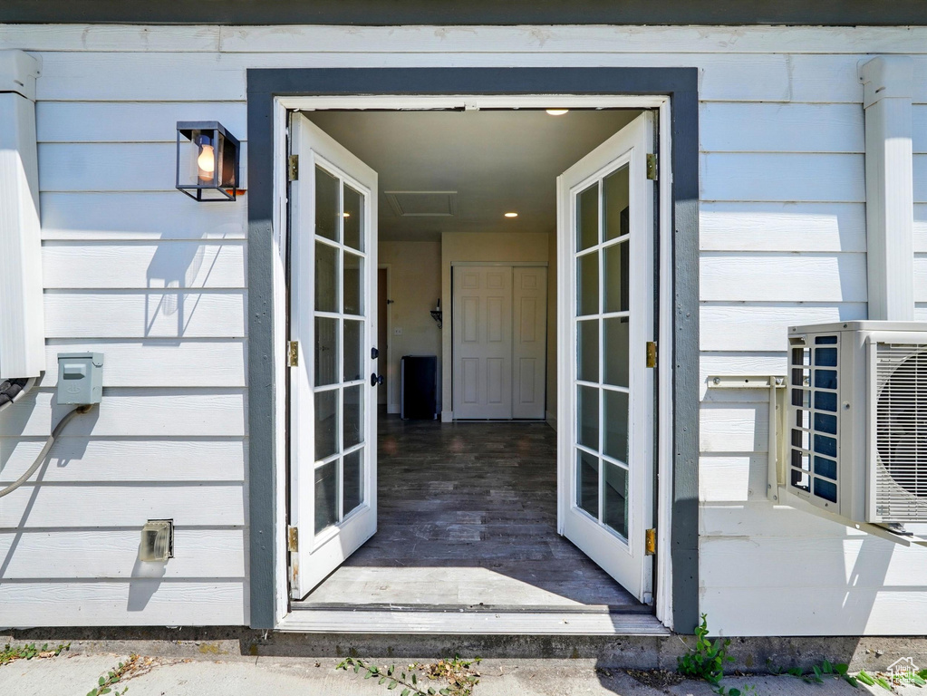 Entrance to property featuring a cooling unit