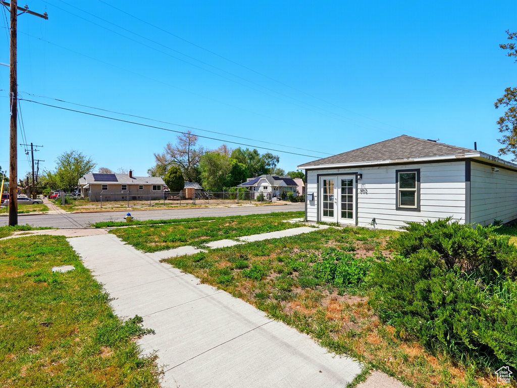 View of yard with french doors