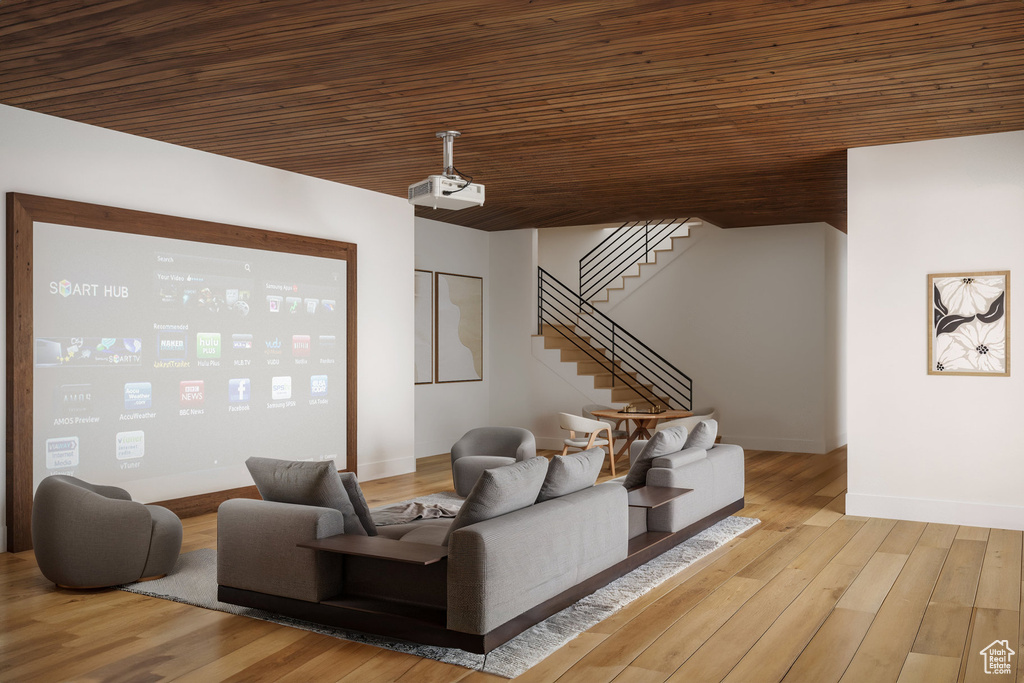 Living area featuring wooden ceiling, stairs, wood finished floors, and baseboards