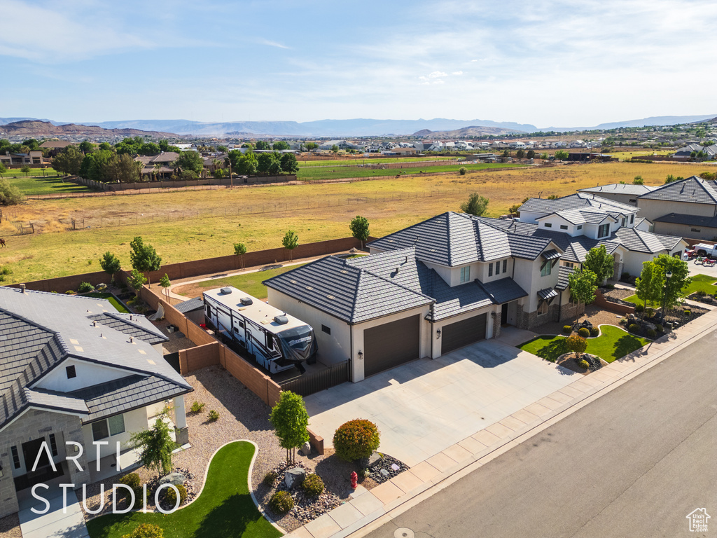 Aerial view featuring a mountain view and a residential view