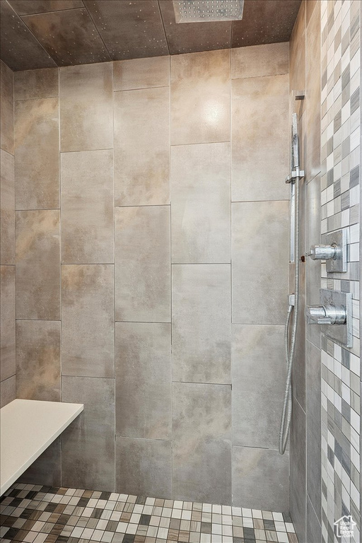 Bathroom featuring tiled shower