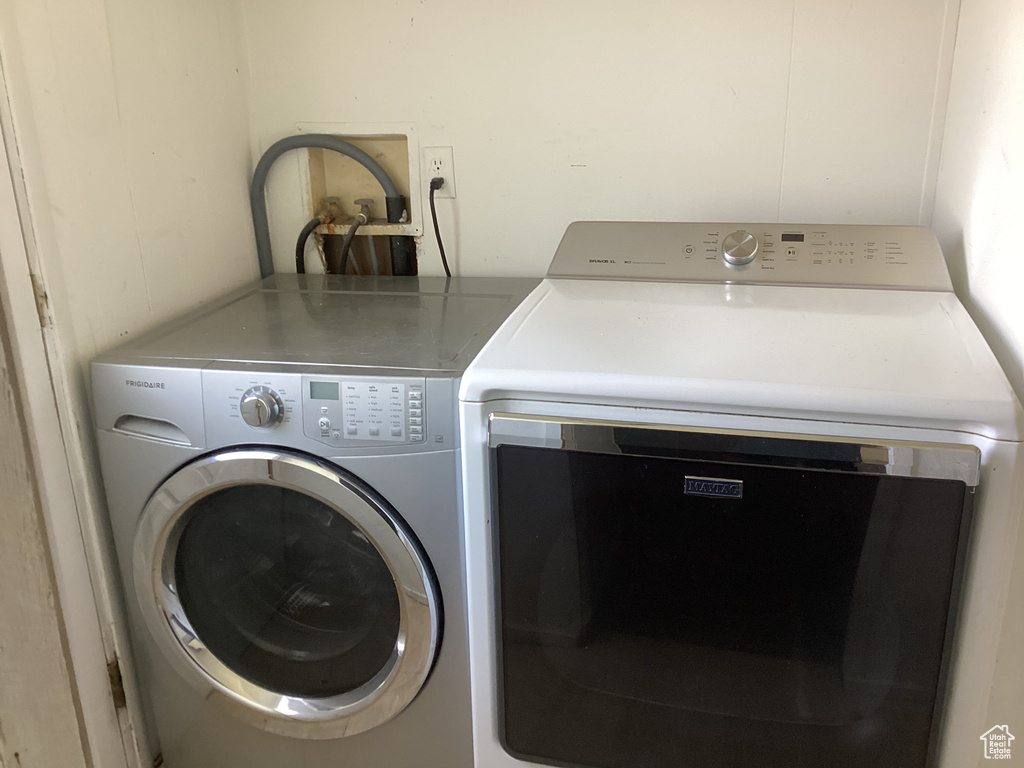 Laundry area with laundry area and washing machine and dryer